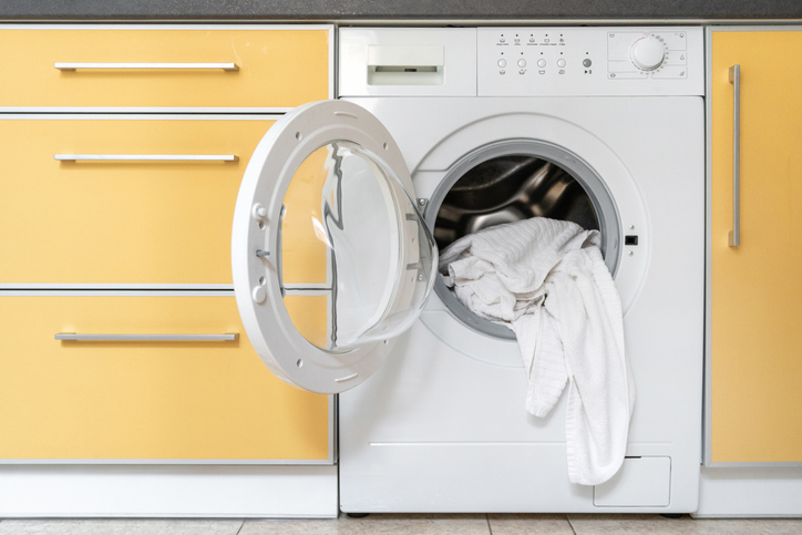 Modern washing machine with fresh and clean laundry