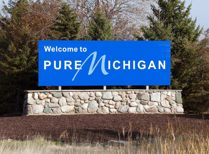 A welcome sign at the Michigan state line.